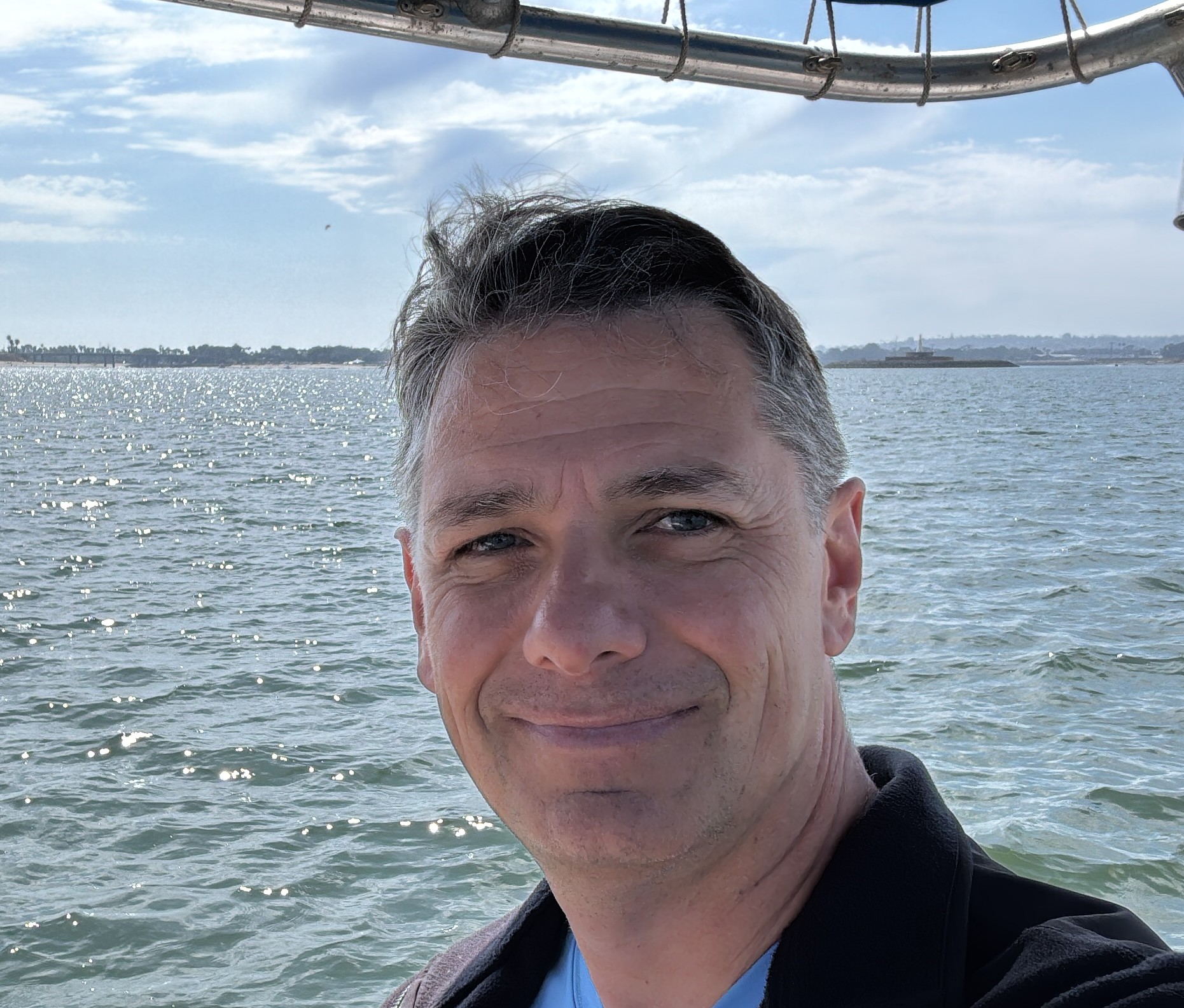 Travis Headshot Sunny SD